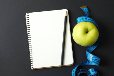 Diet and weight loss, healthy lifestyle, composition with measuring tape