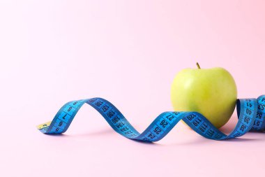 Diet and weight loss, healthy lifestyle, composition with measuring tape