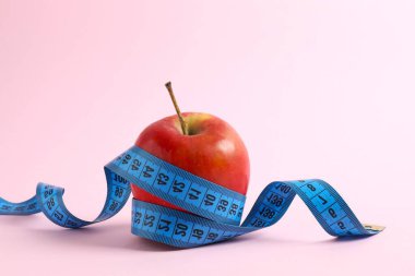 Diet and weight loss, healthy lifestyle, composition with measuring tape