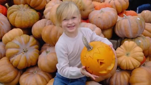 Happy Little Blond Girl Hold Empty Sinister Pumpkin Hands Halloween — Stock Video