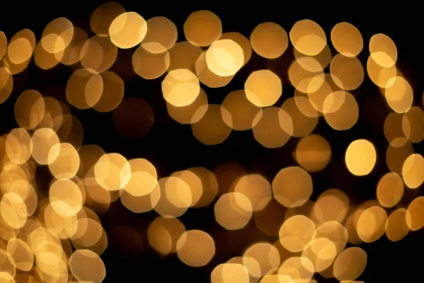 解调的圣诞节金抽象Bokeh背景灯 节日彩灯 模糊的假日假H — 图库照片