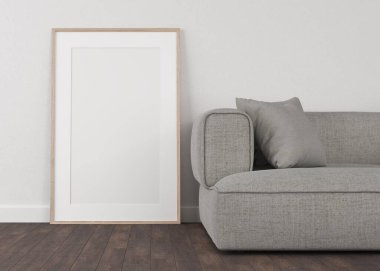 Açık alçı duvar ve ahşap zeminden yapılmış 3 boyutlu çerçeveler. Duvardaki beyaz çerçeveler. Gri Kanepe