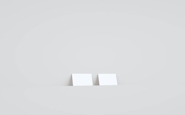 Business Card Mock-Up (3.5 x 2) Duvar Arkaplanına Karşı İki Kart. 3B Görüntü
