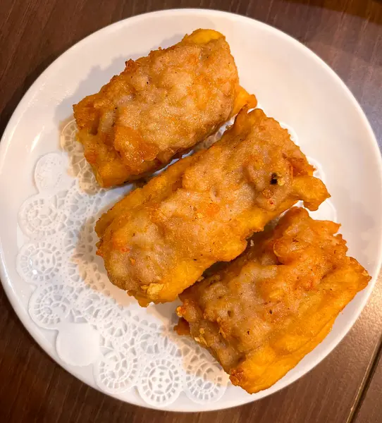 stock image indonesian fried savory snack called cakwe filled with minced chicken and shrimp.