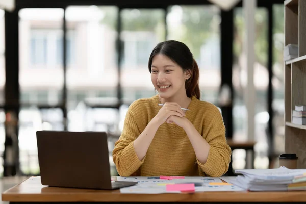 Smart asian business woman smiling at office space. real estate, lawyer, non-profit, marketing, account.