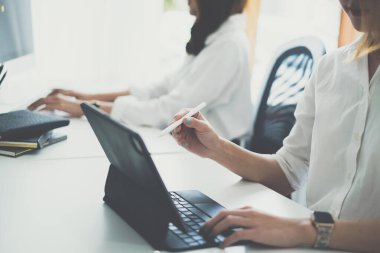 Fund managers team or consultant working with digital tablet to analysis Investment stock market. finance concept