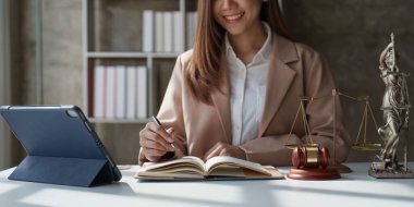 Close up of business lawyers working with agreement contract in office. Law, legal services, advice, Justice concept.