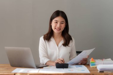 Beautiful business woman analyze fund investment. Business Consulting, Accounting, finance investment concept