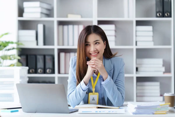 stock image Accountant woman working on laptop and do document, tax, exchange, research, accounting and Financial advisor concept.