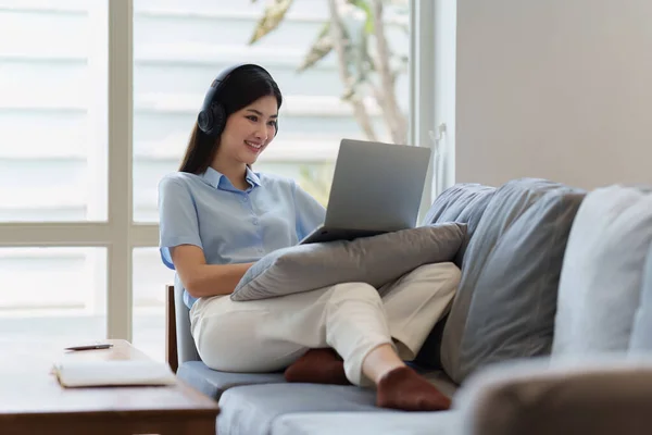 stock image Attractive Asian woman resting comfortable living room and using laptop computer, Relax, Sofa, Lifestyle.