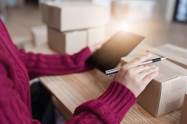 stock image Businesswoman with Laptop and Parcel Box. A Symbol of SME Success in E-Commerce