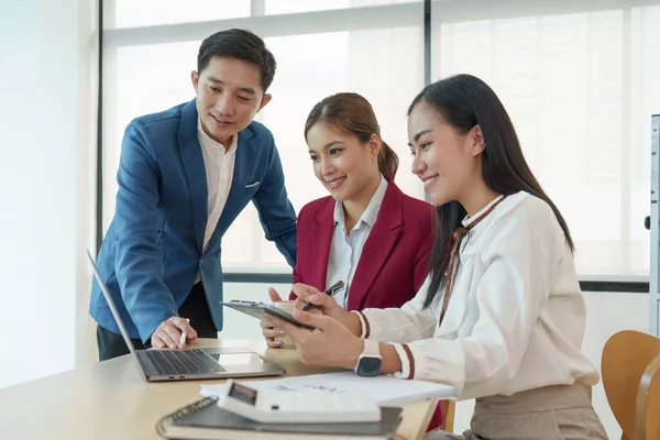 stock image Diverse business team stacking hands and collaboration and analyze financial data for long term investments.