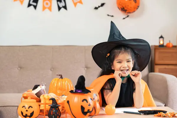 Kids Girl Costume Witch Having Fun Livingroom Eating Candy Celebrating — Stock Photo, Image