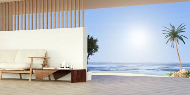 Minimalist mobilyalar ve güneşli günler için ideal çarpıcı okyanus manzaralı şık bir yaşam alanı..
