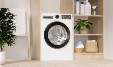 Çağdaş bir yaşam tarzı ve organizasyonel etkinliği vurgulayan bir çamaşır makinesi, şık bir depo ve bitkilerin yer aldığı gösterişli bir çamaşır odası..
