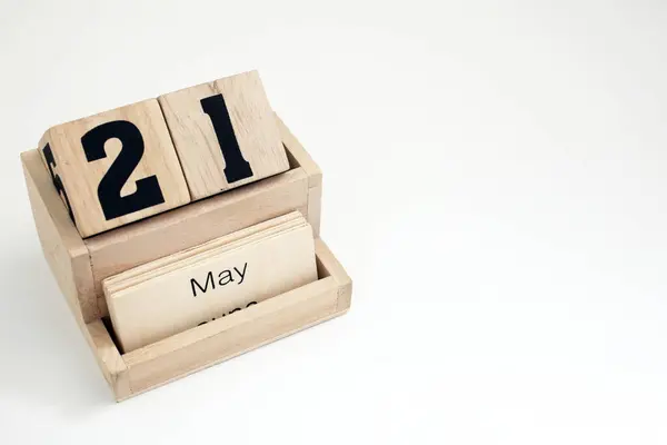 stock image Wooden perpetual calendar showing the 21st of May