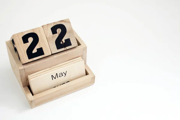 stock image Wooden perpetual calendar showing the 22nd of May