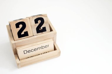 22 Aralık 'ı gösteren ahşap takvim