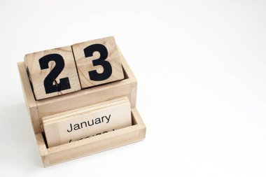 Ahşap takvim 23 Ocak 'ı gösteriyor.