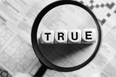 Word Dice büyüteç merceğiyle 