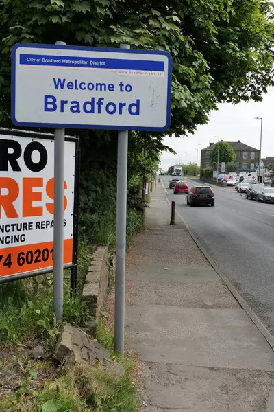 stock image Bradford, UK 05 21 2024 Welcome to Bradford sign with traffic passing in the background.