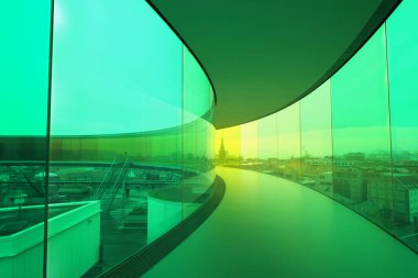 Aarhus, Denmark 11 06 2024 Rainbow rooftop walkway above the Aros art museum. Permanent installation called 'Your rainbow panorama' by Olafur Eliasson in 2011 clipart