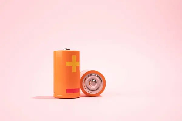 Batería Naranja Concepto Energía Rosa — Foto de Stock