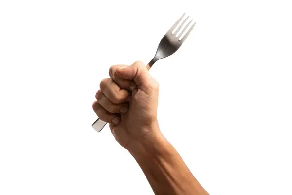 Siyah erkek eli, izole edilmiş beyaz üzerinde gümüş bir çatal tutuyor.