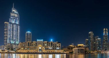 night view of dubai city, united arab emirates  clipart