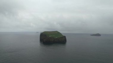 Aerial footage of an uninhabited and isolated island in Iceland with a house/cottage. Filmed with a Drone. Different shots available in my portfolio.