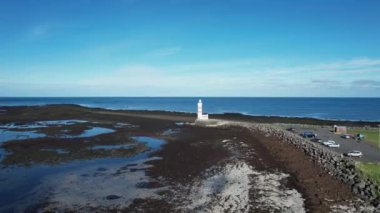 İzlanda, Reykjanes Yarımadası 'ndaki Gardur Deniz Feneri. İnsansız hava aracı ile çekildi. Portföyümde farklı pozlar var..