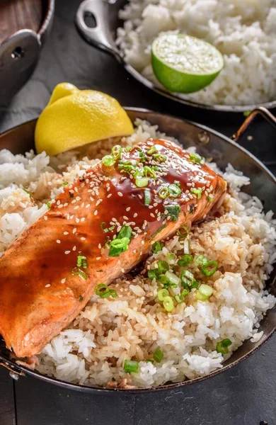 stock image Delicious Top Close-Up of Pan-Fried Salmon Steak with Teriyaki Sauce on Steamed White Rice, Presented in 4K Visual Splendor