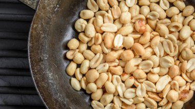 Savory Temptation: Close-Up of Roasted and Salted Peanuts, Showcasing Irresistible Crunchiness in Stunning 4K Ultra HD Resolution clipart