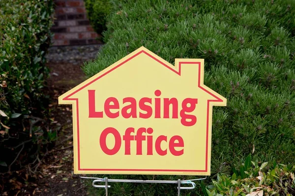 4K Image: Leasing Office Sign in a Front Yard