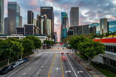 City Lights at Twilight: 4K Ultra HD Image of Downtown Los Angeles Figueroa Street Traffic After Sunset clipart