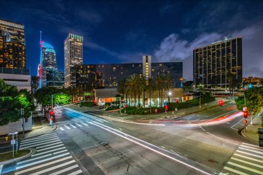 City Lights at Twilight: 4K Ultra HD Image of Downtown Los Angeles Figueroa Street Traffic After Sunset clipart