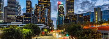 City Lights: 4K Ultra HD Image of Downtown Los Angeles Figueroa Street Traffic After Sunset clipart