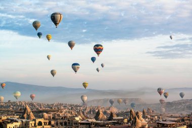 Mesmerizing Sunrise Flight: 4K Ultra HD image of Hot Air Balloons Over Cappadocia Valley clipart