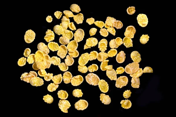 Mucchio Cornflakes Isolati Uno Sfondo Nero Vista Dall Alto — Foto Stock