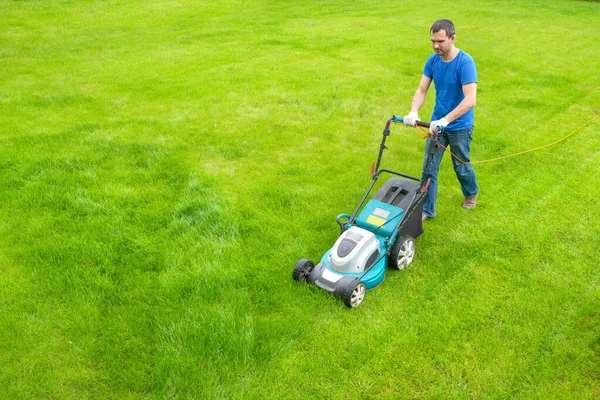 Gardener Lawn Mower Cutting Grass Park Worker Cleaning Garden Royalty Free Stock Images