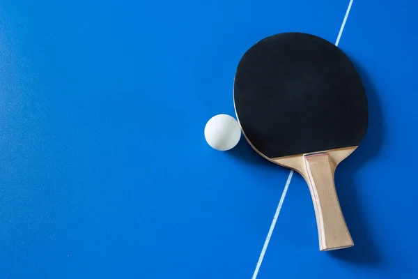 Racket Table Tennis Ball Lying Blue Table View — Stock Photo, Image