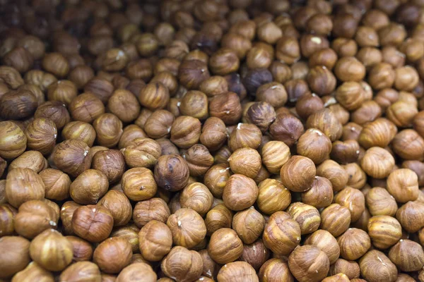 Hazelnuts. Food background, photo wallpaper. plenty peeled nuts.