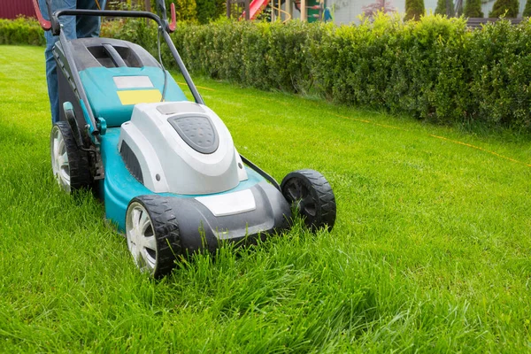 Man Mowing Grass Lawn Mower Garden Sunny Day Lawn Mower Stock Image