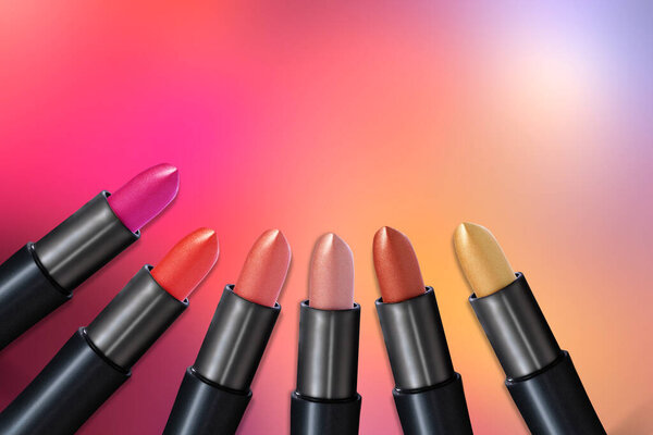A set of lipstick on a color bright background. Top view. Make-up.
