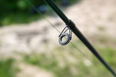 Balıkçı oltası çevirme ayrıntıları, kapatın. Balıkçılık kavramı.