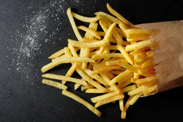 Chips Pommes Frites Svart Bord Utsikt Uppifrån Snabbmat — Stockfoto