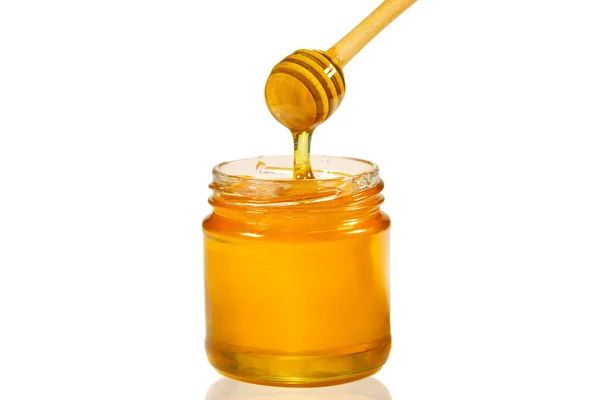 Μέλι Στάζει Από Μέλι Dipper Γυάλινο Βάζο Που Απομονώνονται Λευκό — Φωτογραφία Αρχείου