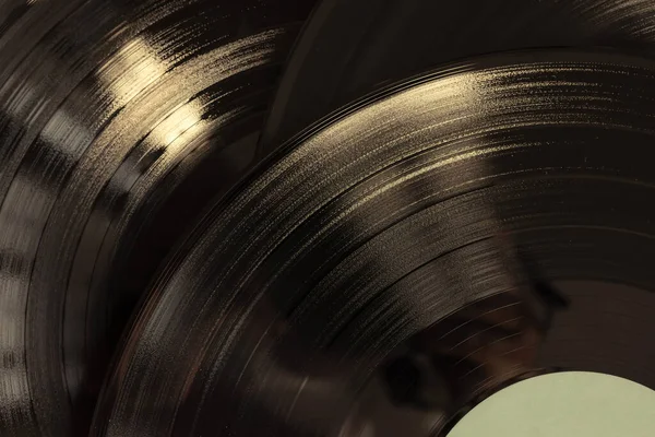 Vinyl discs close-up. Vinyl record texture in vintage style.
