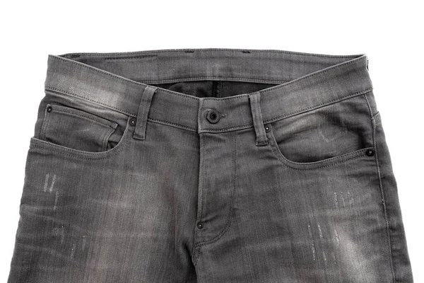 白い背景に隔離された服のためのファッショナブルな灰色のジーンズ 衣料品業界について — ストック写真