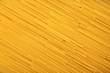 Çiğ spagetti yakın plan. Spagetti arkaplan dokusu.